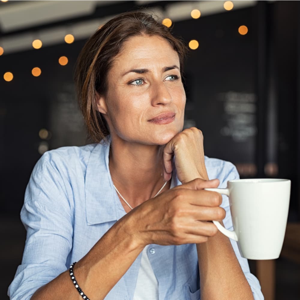 woman drinking coffee