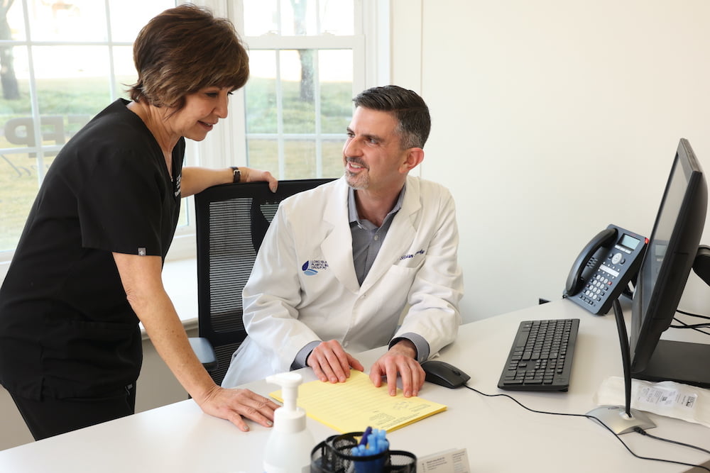 Dr. Pinsky talking to a nurse