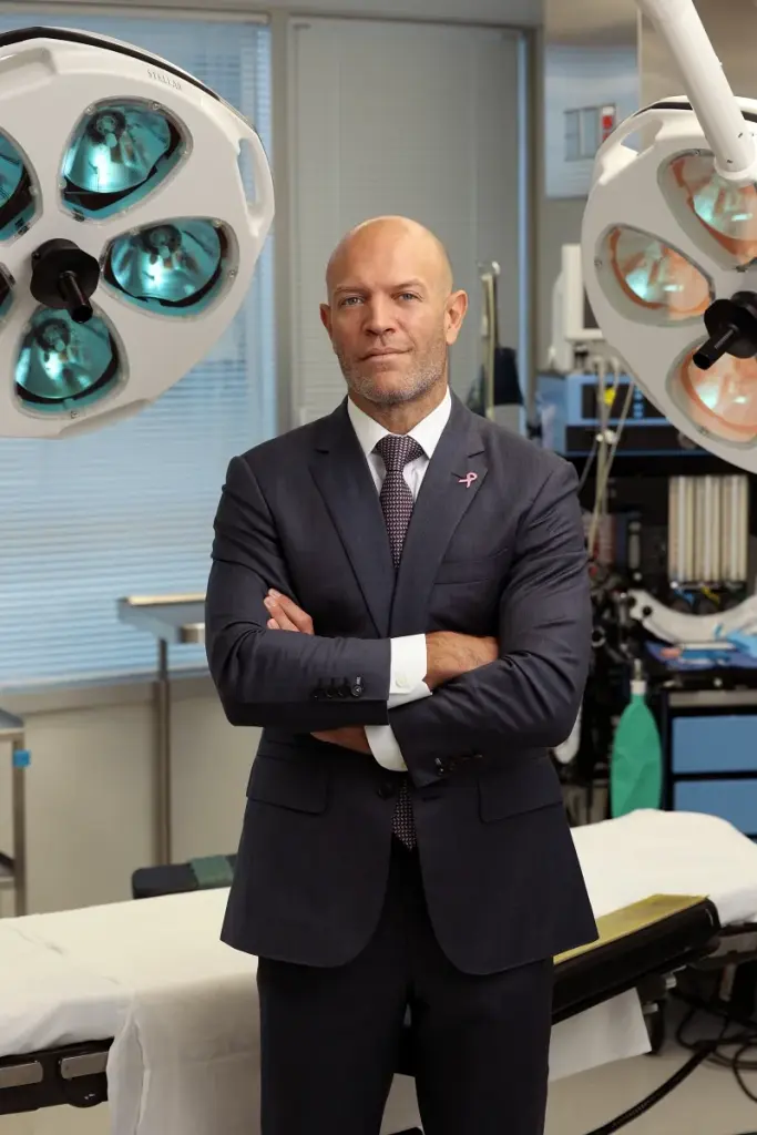 Tommaso Addona, MD, FACS standing in an operating room